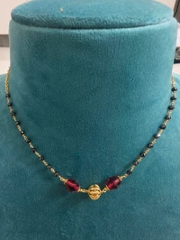 Black Cz's With Red Mani