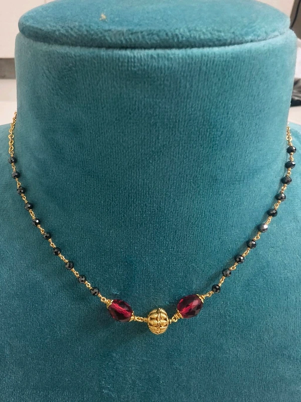 Black Cz's With Red Mani