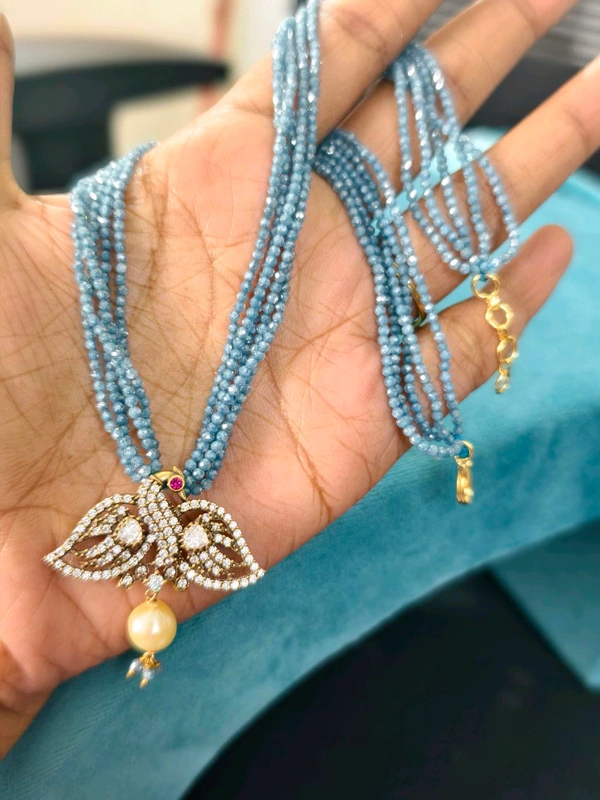 5 LINE CZS WITH PENDENT - blue