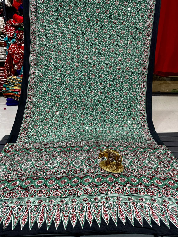 Amrapali Bottle Green Ajrakh Saree with Elegant All-Over Bandhani-Inspired Geometric Motifs and Subtle Mirror Work Border - Free, Green