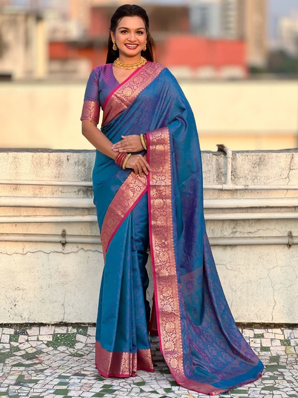 BANDHANI Soft Patola Silk Saree with Bandhani Weaves and Contrast Floral Zari Border