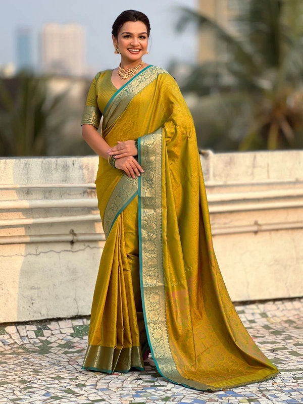BANDHANI Soft Patola Silk Saree with Bandhani Weaves and Contrast Floral Zari Border