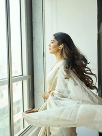 Celebrity Pooja Sawant Inspired Premium Raga Tissue Silk Saree with Elegant Round Butti and Tassels - FREE, Chiku