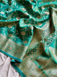 Charming Glass Satin Banarasi Tissue Silk Saree with Floral Zari Jaal and Rich Pallu - FREE, Sea Green