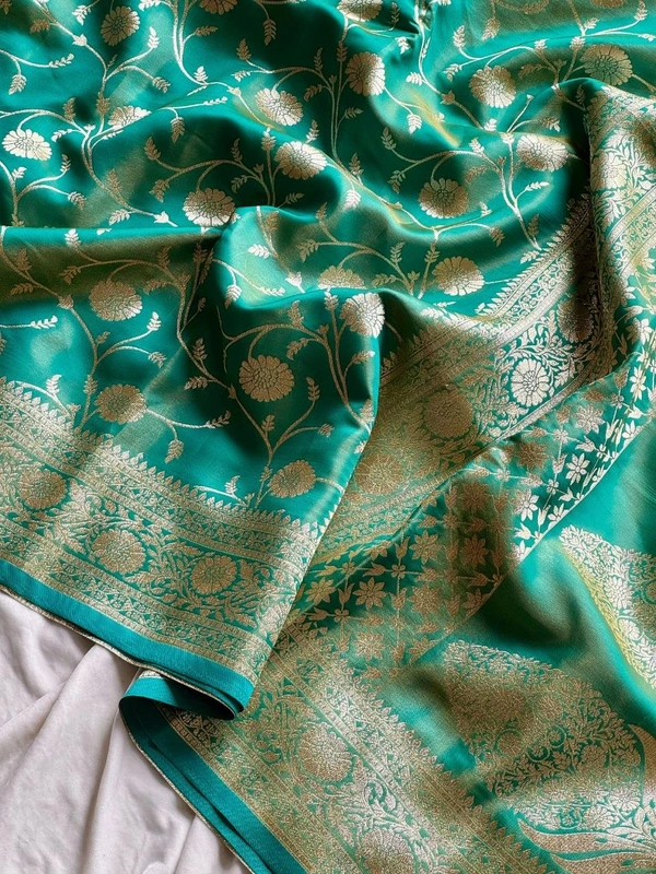 Charming Glass Satin Banarasi Tissue Silk Saree with Floral Zari Jaal and Rich Pallu - FREE, Sea Green