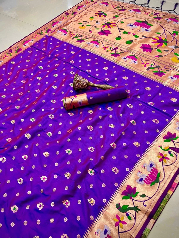 Luxurious  Silk Saree featuring Traditional Paithani Motifs and Contrast Border