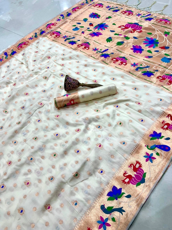 Luxurious  Silk Saree featuring Traditional Paithani Motifs and Contrast Border