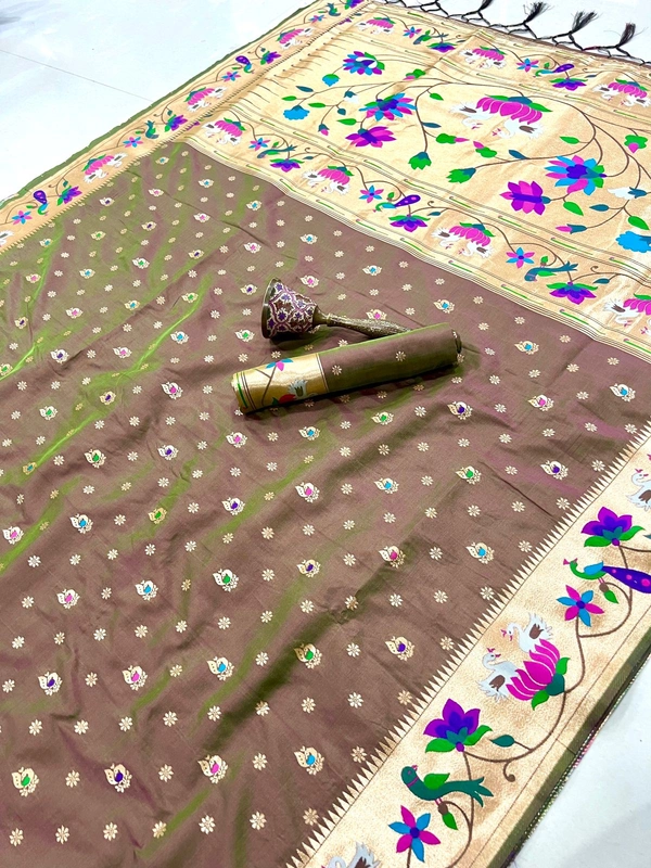 Luxurious  Silk Saree featuring Traditional Paithani Motifs and Contrast Border