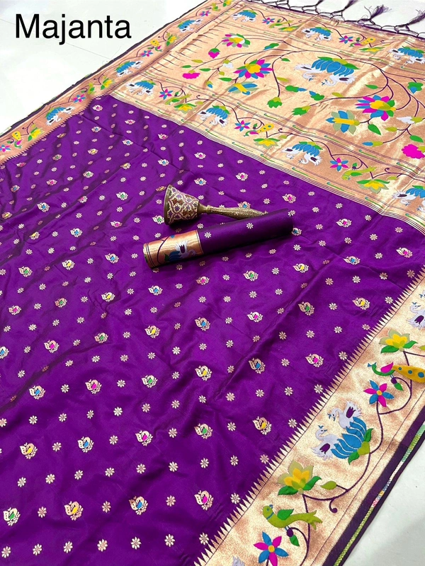 Luxurious  Silk Saree featuring Traditional Paithani Motifs and Contrast Border