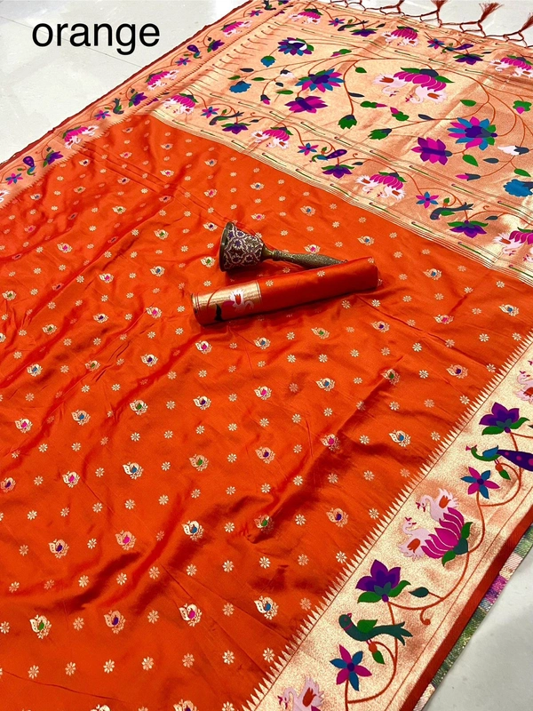 Luxurious  Silk Saree featuring Traditional Paithani Motifs and Contrast Border