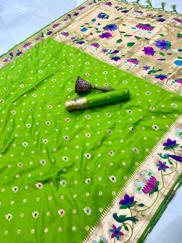 Luxurious  Silk Saree featuring Traditional Paithani Motifs and Contrast Border