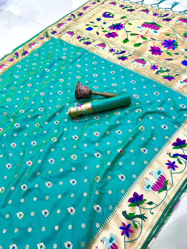 Luxurious  Silk Saree featuring Traditional Paithani Motifs and Contrast Border