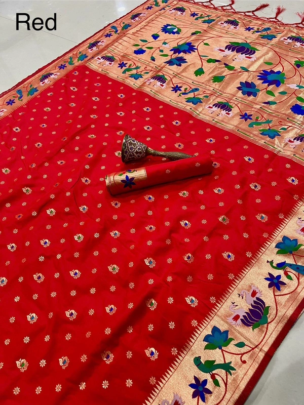 Luxurious  Silk Saree featuring Traditional Paithani Motifs and Contrast Border