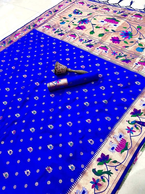 Luxurious  Silk Saree featuring Traditional Paithani Motifs and Contrast Border