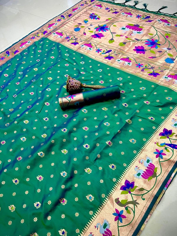 Luxurious  Silk Saree featuring Traditional Paithani Motifs and Contrast Border