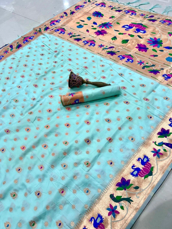 Luxurious  Silk Saree featuring Traditional Paithani Motifs and Contrast Border