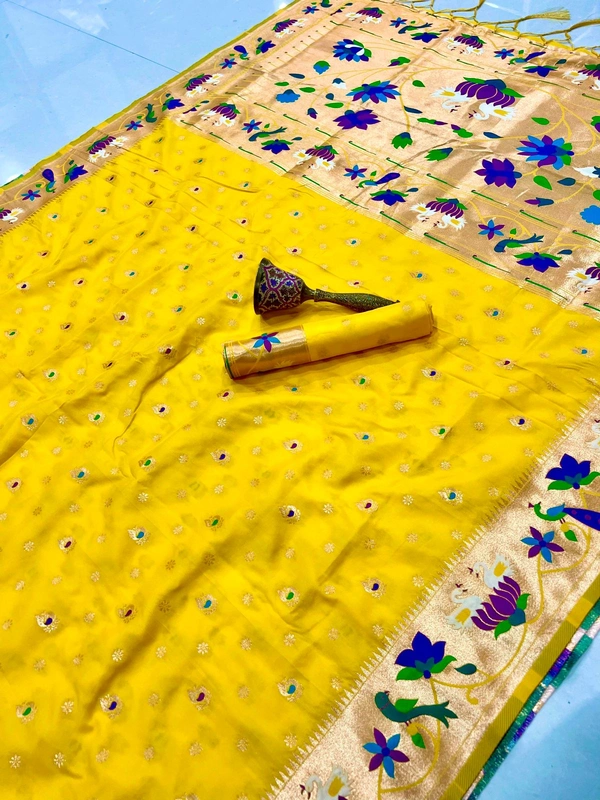 Luxurious  Silk Saree featuring Traditional Paithani Motifs and Contrast Border