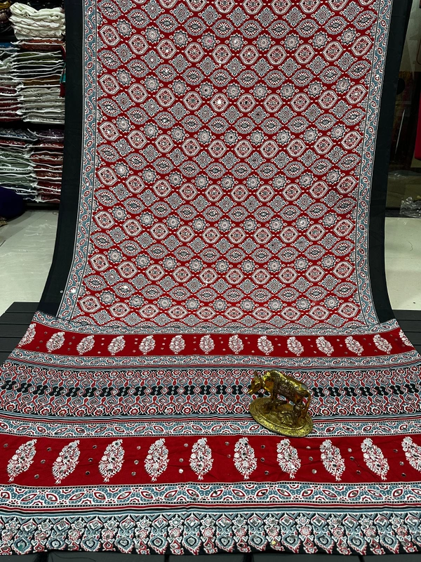 Mrunmayee Brick Red Ajrakh Print Saree with Ornamental Jaal Design and Festive Mirror Work Details - Free, Brick Red