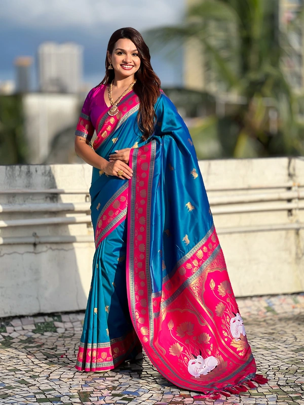 Soft Silk Paithani Saree with Traditional Nandi Cow Motifs & Satin Lotus Border