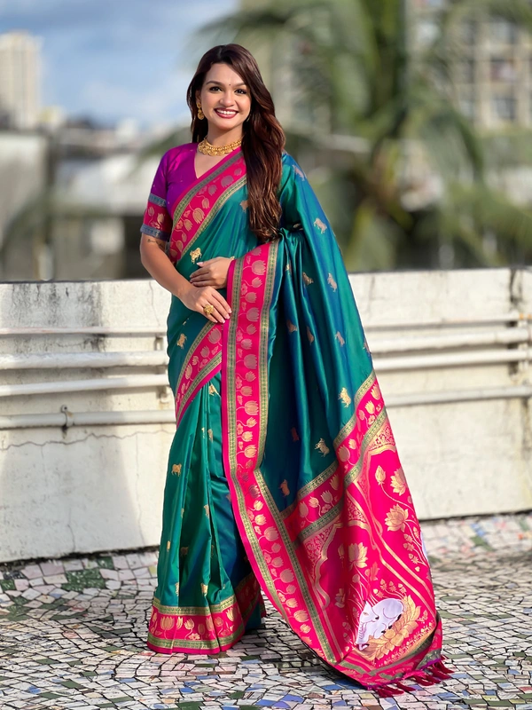 Soft Silk Paithani Saree with Traditional Nandi Cow Motifs & Satin Lotus Border