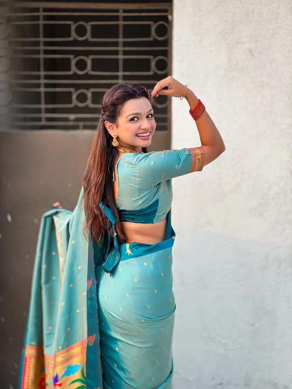 Trending Soft Silk Collection � Nature Inspired Pichwai Pallu with Contrast Parrot Border - FREE, SKY