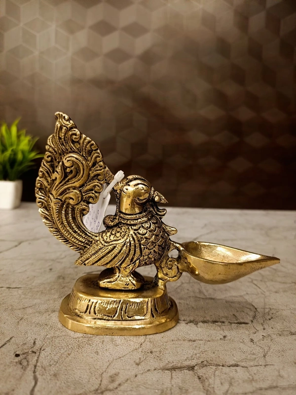 DecorsOne Brass Annapakshi Holding Single face Diya 4.5