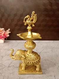 DecorsOne Brass Elephant With Annam Five Face Diya 11″