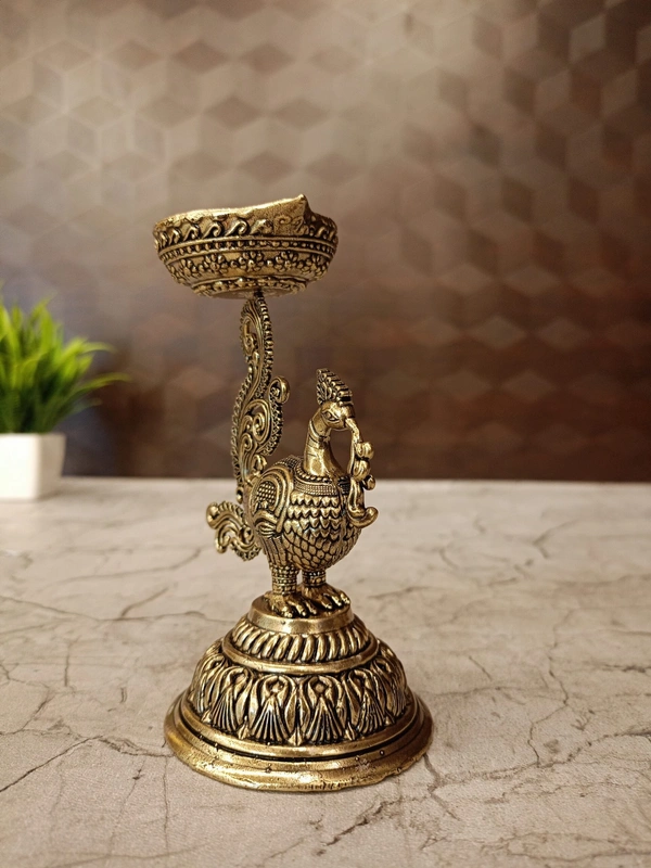 Brass Fine Art Peacock Holding Diya