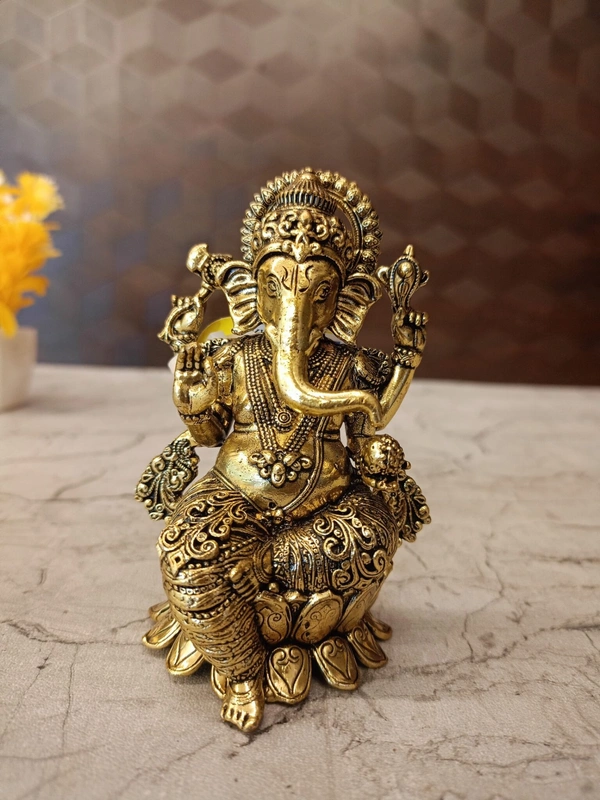 Brass Fine Art Ganesha Idol Sitting On Lotus Base