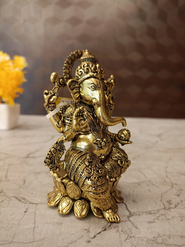 Brass Fine Art Ganesha Idol Sitting On Lotus Base