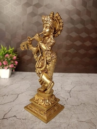 DecorsOne Brass Krishna with Floral Base Idol- 10″