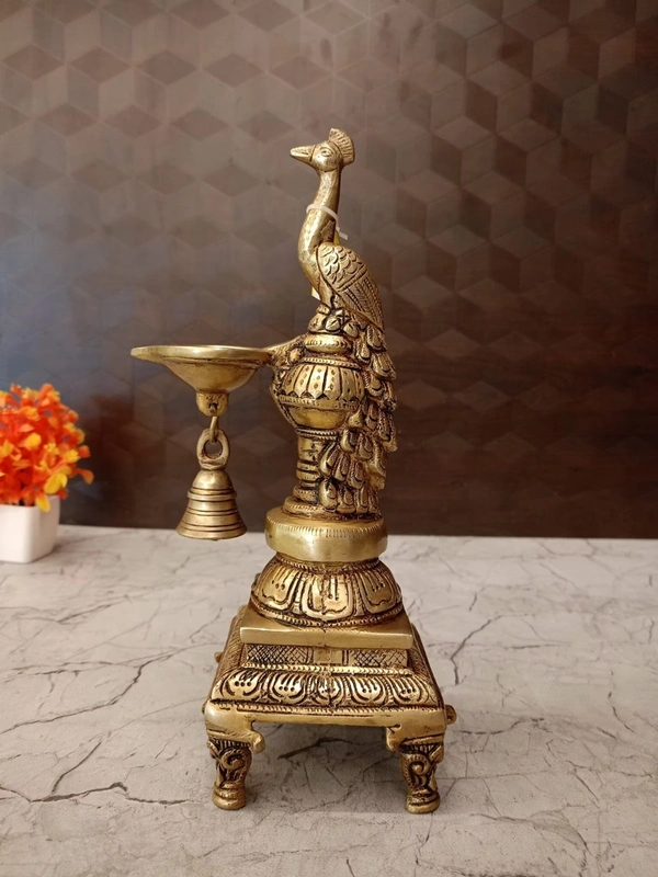 DecorsOne Brass Peacock Diya with Bell- 12″
