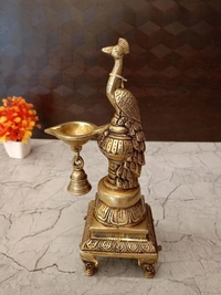 DecorsOne Brass Peacock Diya with Bell- 12″