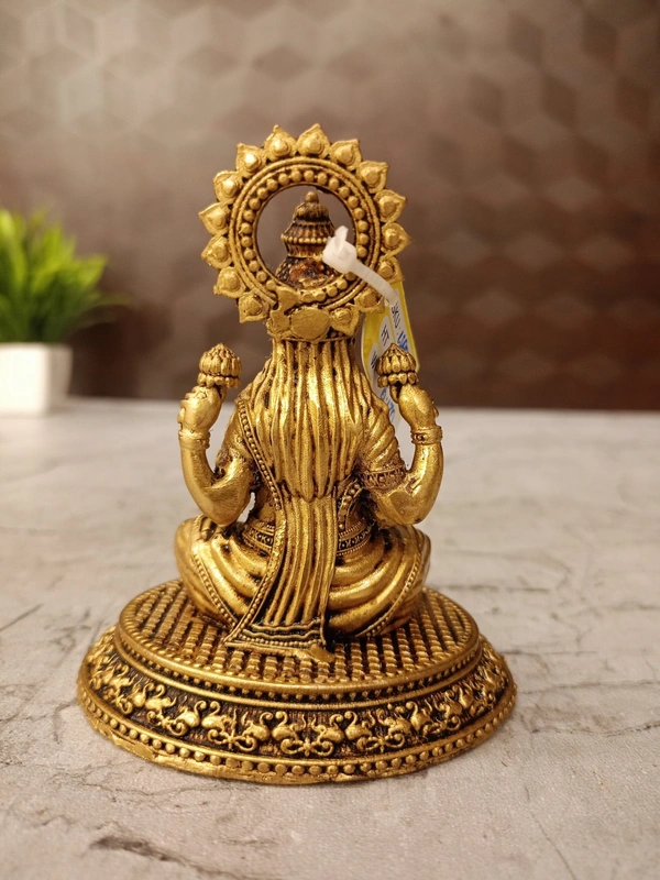 Brass Fine Art Lakshmi Idol Sitting On Oval Base