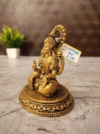 Brass Fine Art Lakshmi Idol Sitting On Oval Base