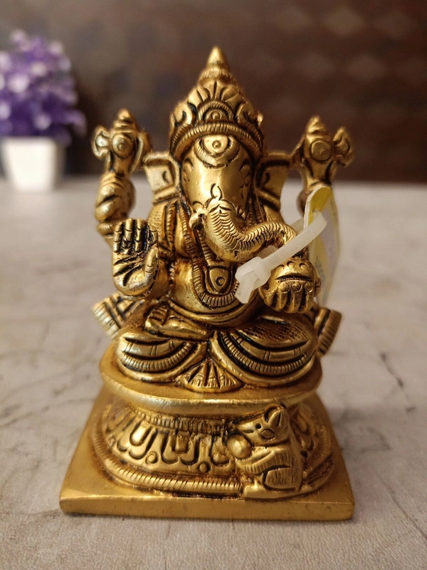 Brass Small Ganesha Idol Sitting On Square Base / Very Unique And Handicraft Statue