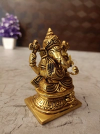 Brass Small Ganesha Idol Sitting On Square Base / Very Unique And Handicraft Statue