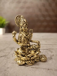 Brass Fine art Lakshmi idol on Lotus