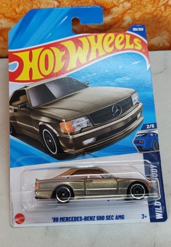 Hot Wheels 1:64 Scale | 89 MERCEDES-BENZ 560 SEC AMG | WILD WIDEBODY | Metallic Gold | 2/5 | 186/250