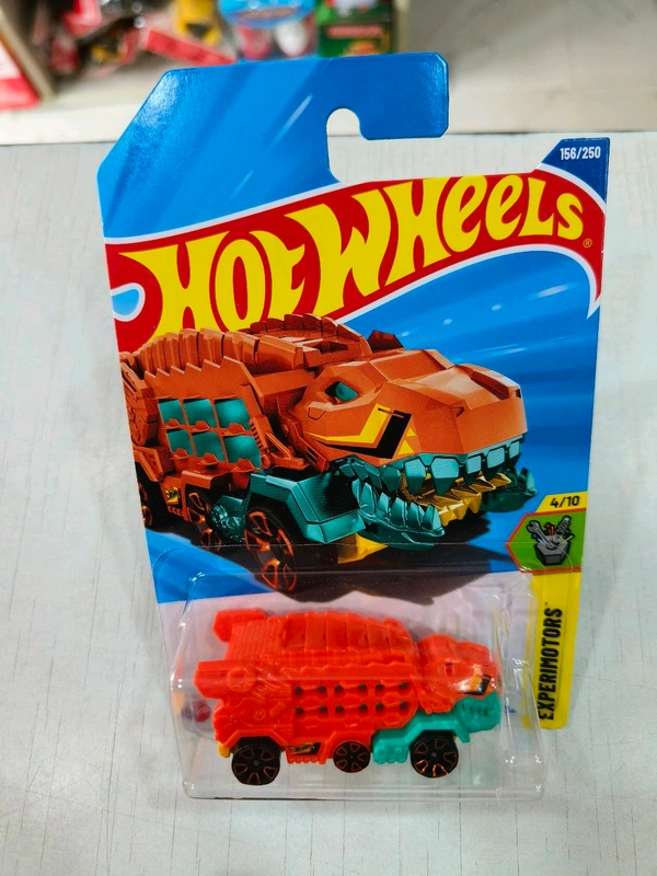 Hot Wheels HW Ultimate T-rex Transporter | Experimotors | Orange | 156/250