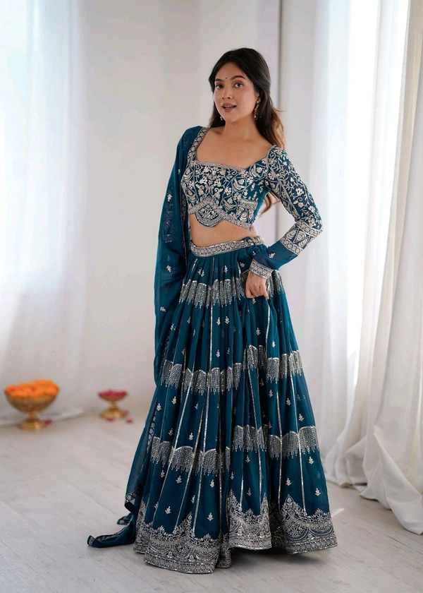  *LEHENGA*
	•	Fabric: Faux Georgette 