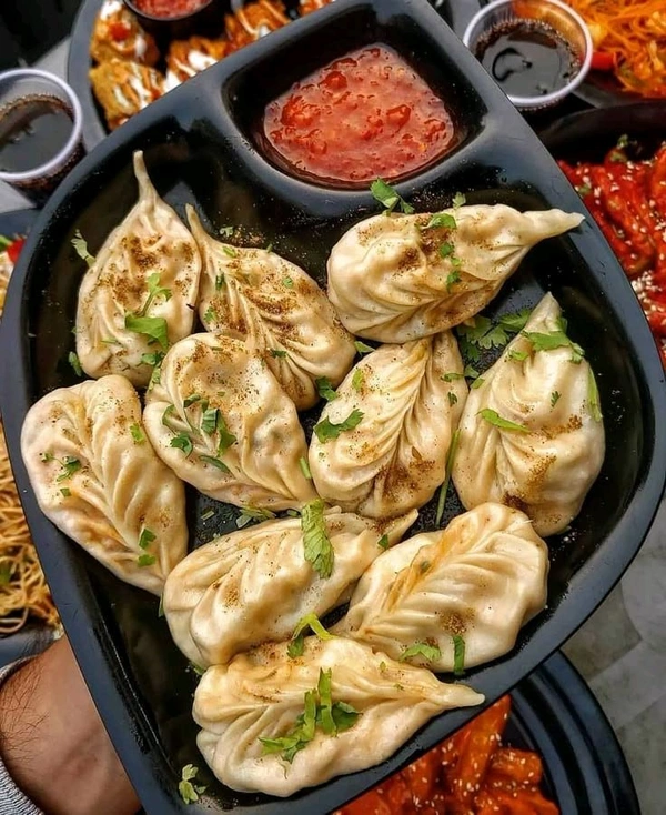 Momos - Obra