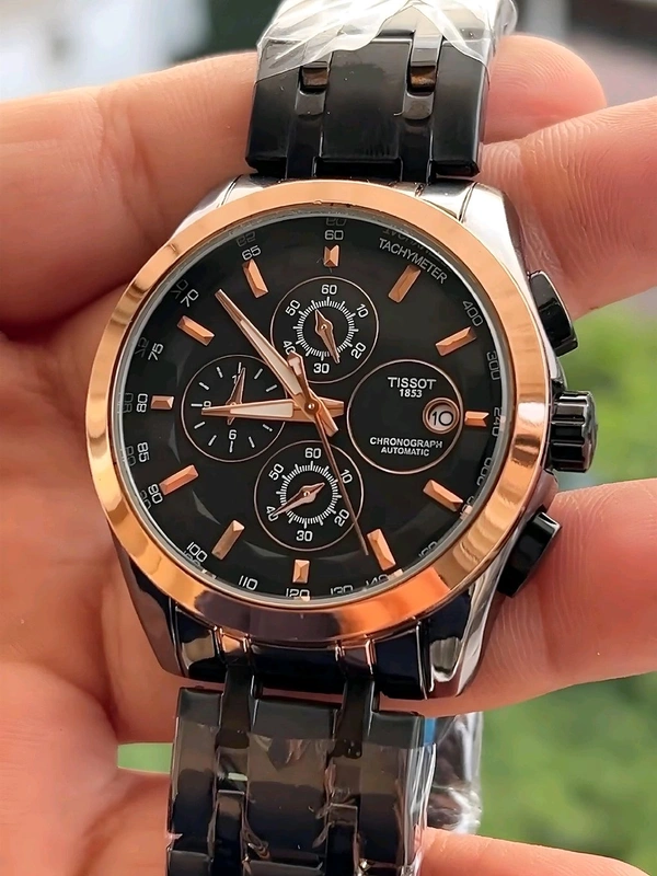 TISSOT_ COUTURIER_ Chronograph watch with a black dial, Rose Gold accents, and a Black stainless steel Metal For Men