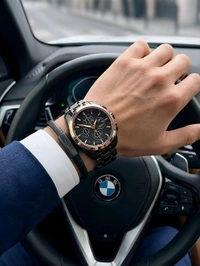 TISSOT_ COUTURIER_ Chronograph watch with a black dial, Rose Gold accents, and a Black stainless steel Metal For Men