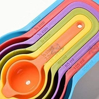 The Baking Curv Measuring Spoon MultiColour