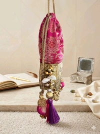 Benarasi Potlis With Brass Base