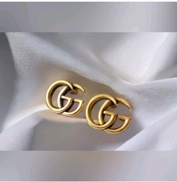 Gold plated twin G alphabet stud earrings