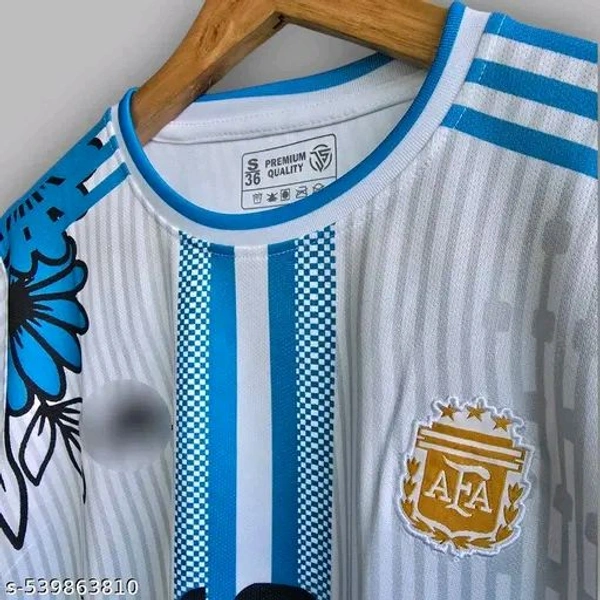 "Unleash bold style with this unique Messi Argentina No. 10 jersey—featuring dragon & floral artwork in electric blue. A perfect blend of tradition and creativity for true fans. Premium feel, standout design. COD & fast pan-India delivery"