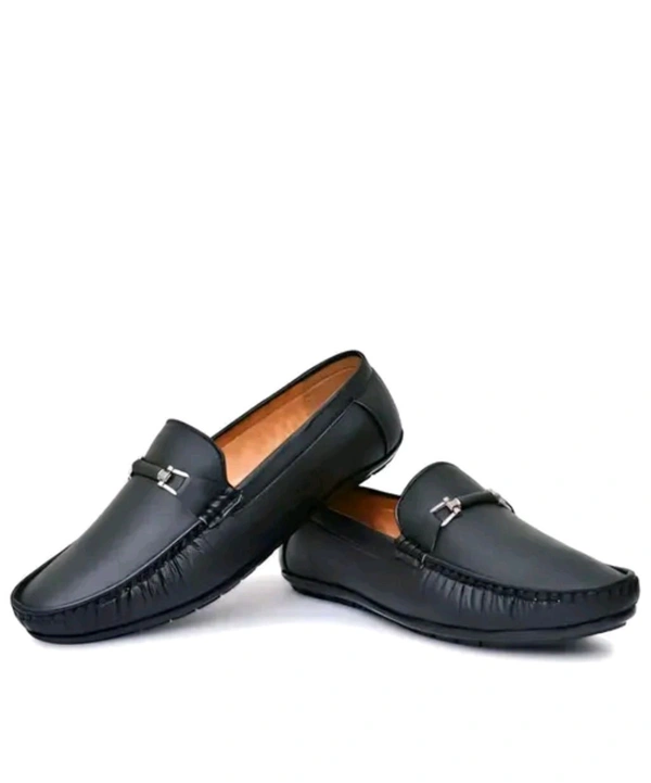 NEW TRENDY BLACK LOAFER
Name: NEW TRENDY BLACK LOAFER
Material: Synthetic
Sole Material: Pvc
Fastening: Slip On
Toe Shape: Round Toe
Net Quantity (N): 1
M.D. Loafer shoes are so comfortable shoes and wearing them looks very good.
Sizes:
IND-6 (Foot Length Size: 25 cm, Foot Width Size: 10 cm)
IND-7 (Foot Length Size: 26 cm, Foot Width Size: 10.1 cm - 10