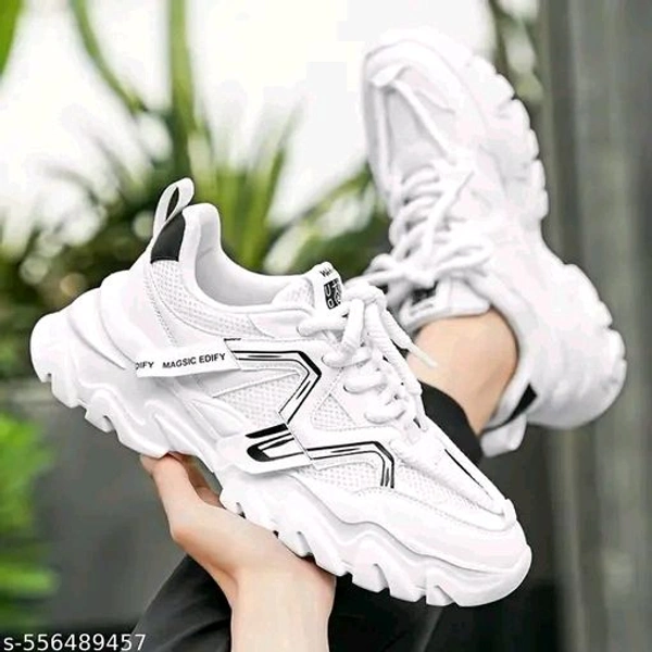 Men Sneakers
Name: Men Sneakers
Material: Mesh
Sole Material: PU
Pattern: Solid
Fastening & Back Detail: Lace-Up
Net Quantity (N): 1
Step into style and comfort with these ultra-modern white chunky sneakers. Designed with a breathable mesh upper, bold black accents, and a uniquely sculpted sole, these shoes offer both fashion- - 9